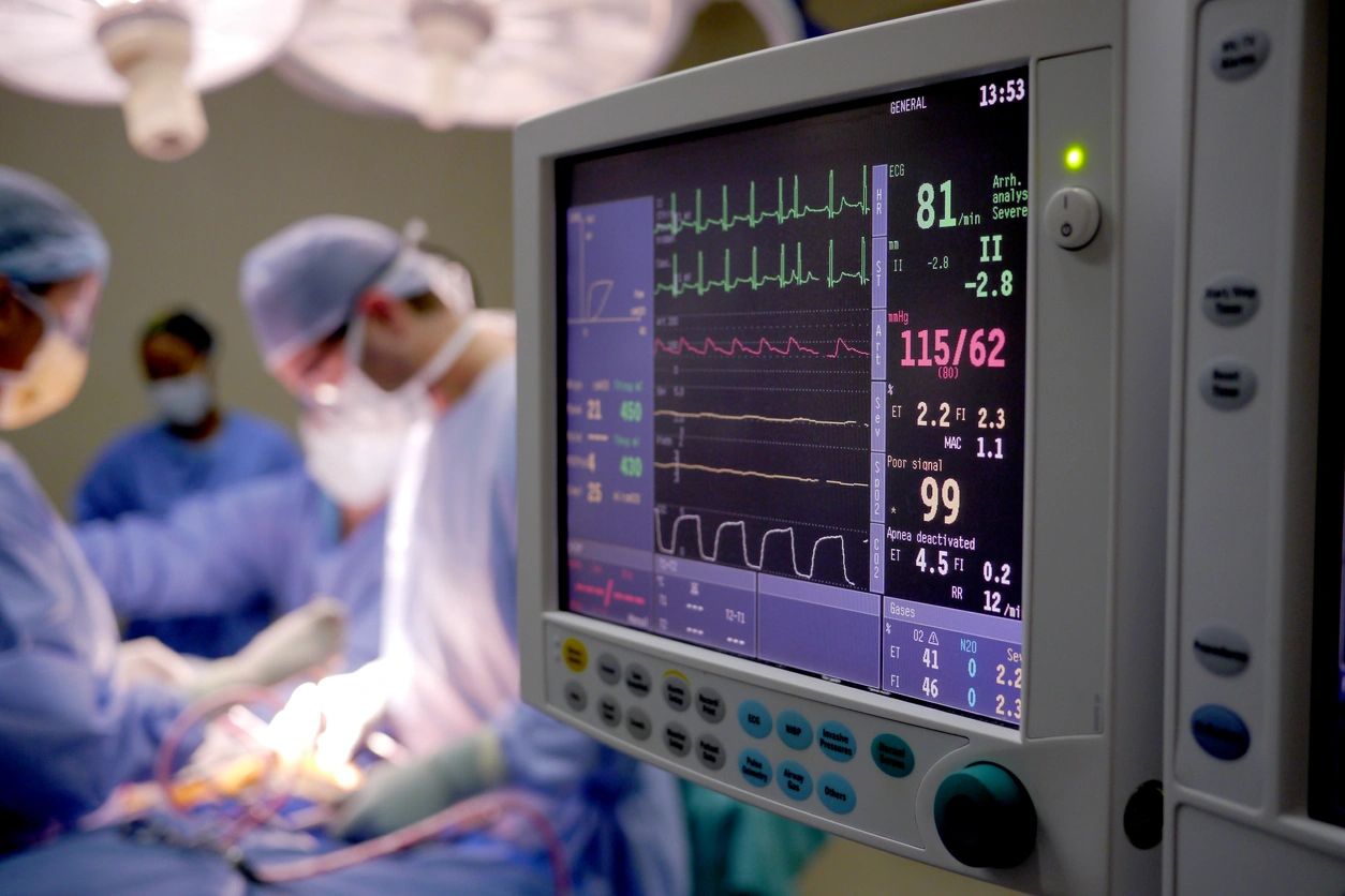 Heart monitor displaying vital signs during surgery.